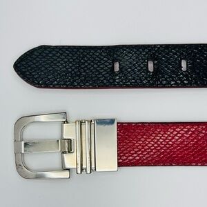Reversible hot pink/black faux snakeskin belt with chrome buckle